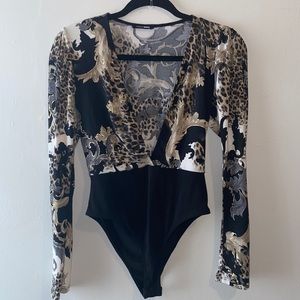 Bodysuit with clip